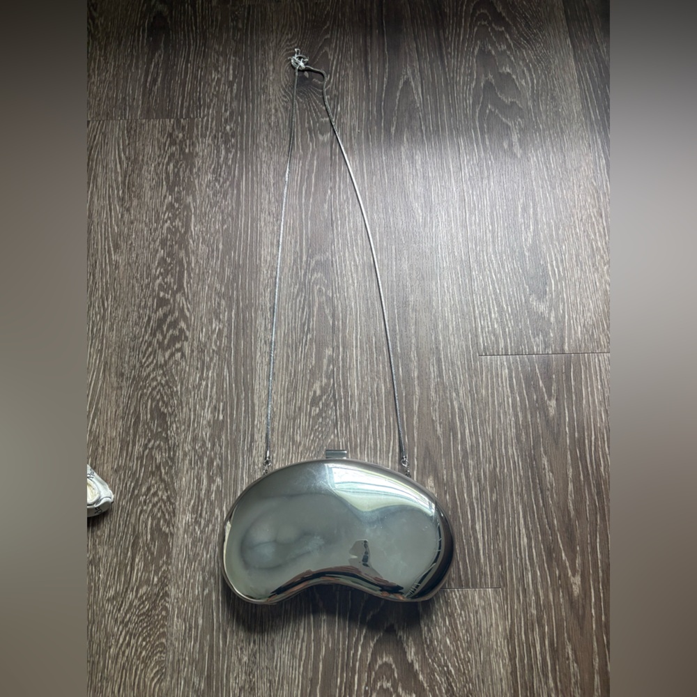 Mango Metallic Silver Curved Clutch